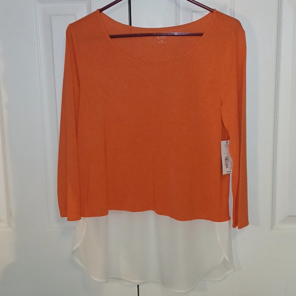 Ana size M. Long sleeves. Tangerine w/white sheer bottom